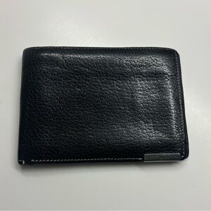 Tumi black leather wallet